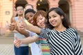 Group of young people with thumbs up Royalty Free Stock Photo