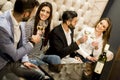 Group of young people toasting with white wine Royalty Free Stock Photo