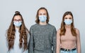 Group young people wearing face mask for preventing corona virus outbreak. Health, quarantine and pandemic concept - Royalty Free Stock Photo