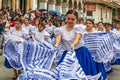 Group of young pretty women folk dancers in typical cloth of Azuay province, Ecuador