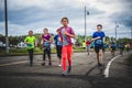 Group of Young Runners and Kids Racing Together Royalty Free Stock Photo