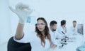 Group of young scientists working in the laboratory. Royalty Free Stock Photo