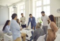 Group of young and senior business people having a discussion during a work meeting Royalty Free Stock Photo