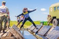 a group of young sport girl overcome the obstacles of the race of heroes competition. Text in Russian: Race of Heroes Royalty Free Stock Photo