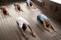 Group of young people in Child pose, top view