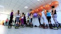 Group of young sporty women doing fitnes exercises with kangoo jumps shoes in a gym.