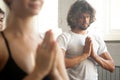 Group of young sporty people make namaste gesture, closeup Royalty Free Stock Photo