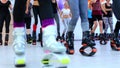 Group of young sporty women doing fitnes exercises with kangoo jumps shoes in a gym.