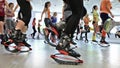 Group of young sporty women doing fitnes exercises with kangoo jumps shoes in a gym.