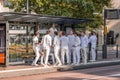 Group of young students dressed in white gathered for a social occasion in Utrecht, the Netherlands