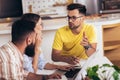 Young students preparing for exams in home interior Royalty Free Stock Photo