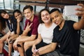 Group of young teenager friends on a basketball court relaxing taking a selfie