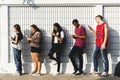 Group of young teenager friends chilling out together