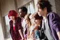 Group of young teens staring into distance. Royalty Free Stock Photo