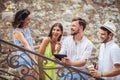 Group of young tourist friends with digital tablet Royalty Free Stock Photo