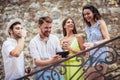 Group of young tourist friends with digital tablet Royalty Free Stock Photo