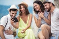 Group of young tourist friends with digital tablet Royalty Free Stock Photo