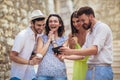 Group of young tourist friends with digital tablet Royalty Free Stock Photo