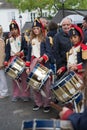 Group of young, vibrant drummers and percussionists playing music together on a city street Royalty Free Stock Photo