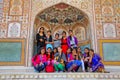 Group of young women gathering at Ganesh Pol in Amber Fort, Rajasthan, India