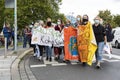 Group of Young Women Marching with Banner Against Climate Change 3