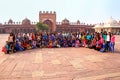 Group of young women standing in the courtyard of Jama Masjid in