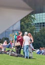 Group of youngsters on Museum Square, Amsterdam, Netherlands