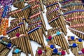 A group of zamponas (pan flutes) for sale at the Indian market in Otavalo in Ecuador. Royalty Free Stock Photo