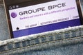 Groupe BPCE website displayed on smartphone hidden in jeans pocket Royalty Free Stock Photo