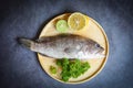 Grouper fish on wooden plate, Fresh raw seafood fish for cooked food Royalty Free Stock Photo