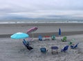 Grouping of beach chairs arranged in circle, Long Sands Beach, York, Maine, summer, 2022 Royalty Free Stock Photo