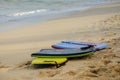 Grouping of 3 boogie boards on the beach in Hawaii