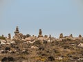 Grouping stones as a symbol of knowledge and desire to return.