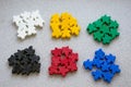 Groups of colorful meeples of two teams. Colors of ukrainian flag - blue and yellow. Small figures of man