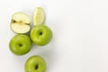 Groups of green apple with cut in half slices isolated on white background, organic fruits for health, a set of apples on top view Royalty Free Stock Photo