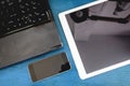 Group of modern electronic devices, computer laptop, digital tablet and mobile smart phone on wooden table Royalty Free Stock Photo