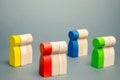 Groups of multicolored wooden people. The concept of market segmentation. Target audience, customer care. Market group of buyers. Royalty Free Stock Photo