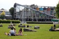 Groups of people relaxing on a sunny day in downtown Vancouver, British Columbia, Canada