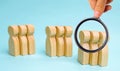Groups of wooden people. The concept of market segmentation. Marketing segmentation, target audience, customer care. Market group Royalty Free Stock Photo