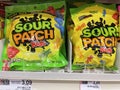 Bagged candy on a. Retail store shelf Sour Patch variety and price tag