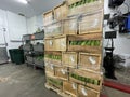 Grocery store Whole cases of corn shipment side view Royalty Free Stock Photo