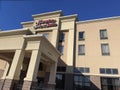 Hampton Inn and Suites hotel exterior front entrance sign