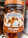Ice Cream toppings on a retail store shelf Smuckers topping pecans