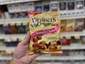Retail store candy hand holding Wethers Originals caramels Royalty Free Stock Photo