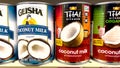 Retail store shelf Various asian branded canned coconut milk