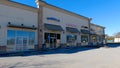 Retail strip mall clear blue sky barbershop