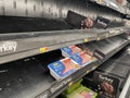 Walmart retail store empty meat market shelves few packs