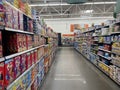 Walmart retail store interior looking down the cereal aisle