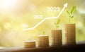 Growing growth year 2020 to 2023. Business graph with arrow up. Growing money coins stack. Saving money investment Royalty Free Stock Photo
