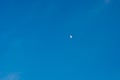 The growing moon or crescent moon is on a canvas of blue clear sky. Earth satellite, space Royalty Free Stock Photo